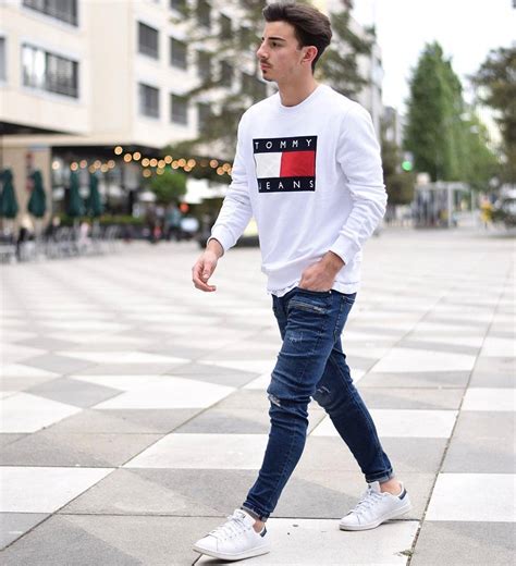 white sneakers and jeans